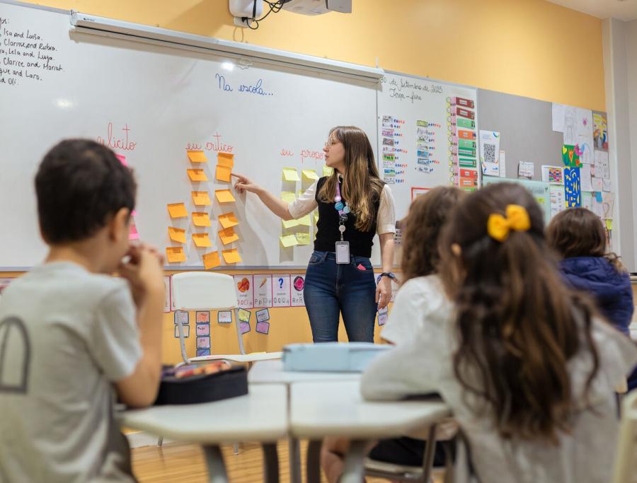 Teacher leading a classroom lesson at Escola Eleva Brasília, backed by Inspired Education's investment in Brazilian schools