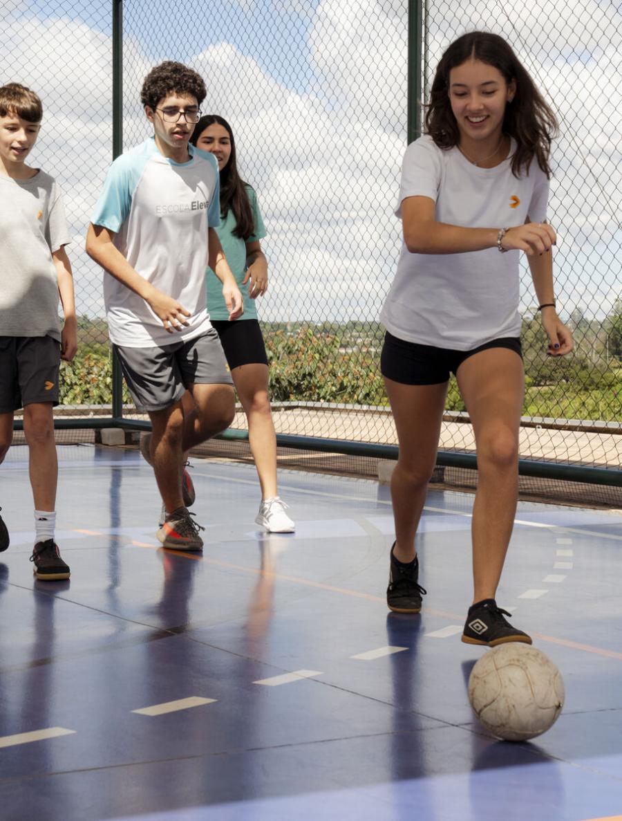 students playing soccer
