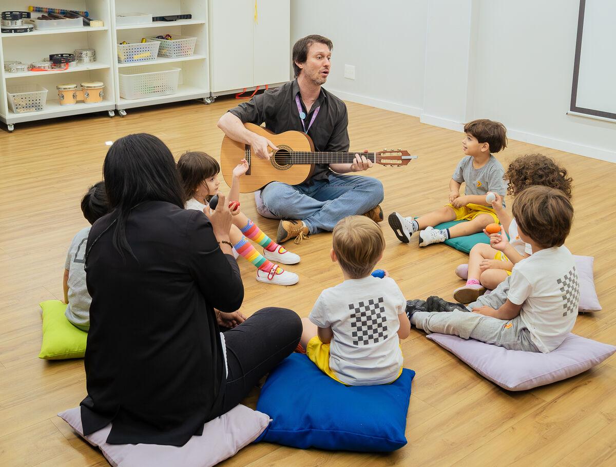 Kindergarten students in a music class at Escola Eleva Brasília in Asa Sul